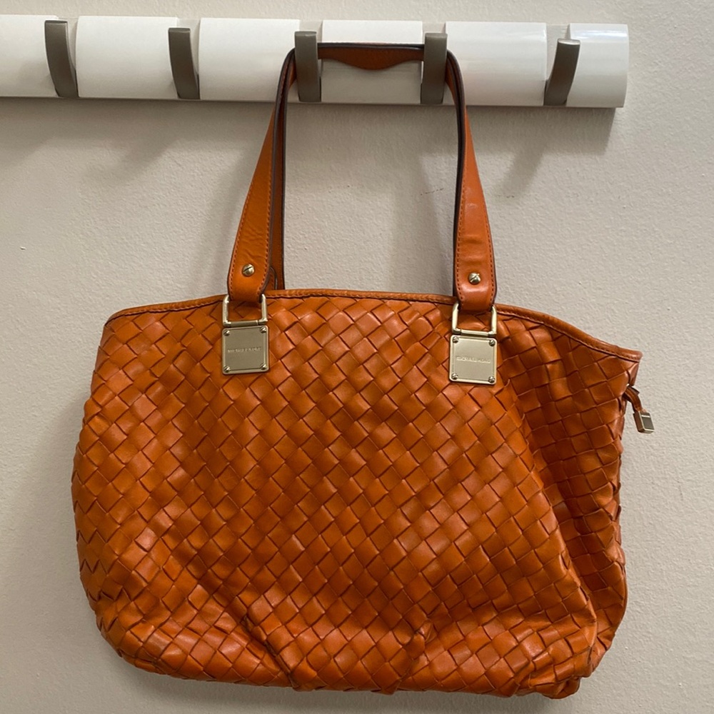 Orange basket weave Michael Kors bag